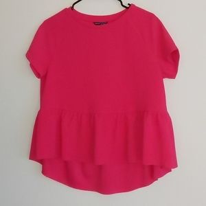 Hot pink hi-low peplum top